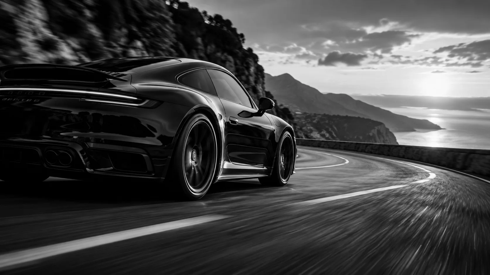 A black sports car in motion representing performance marketing and measurable action